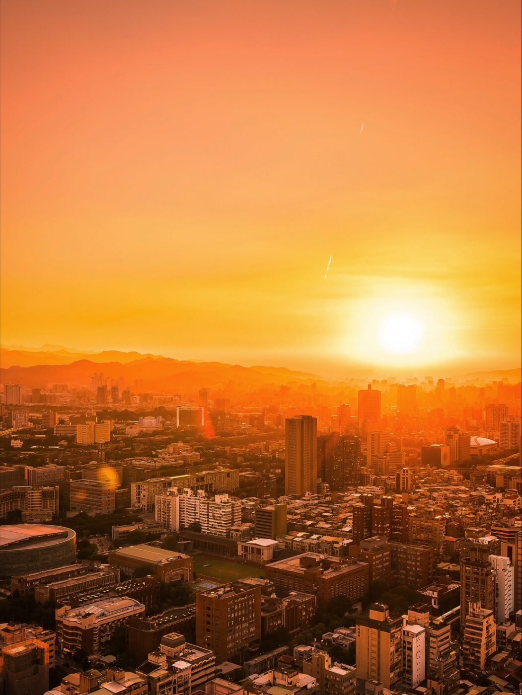 都市 夕日 猛暑 ヒートアイランド現象 イメージ